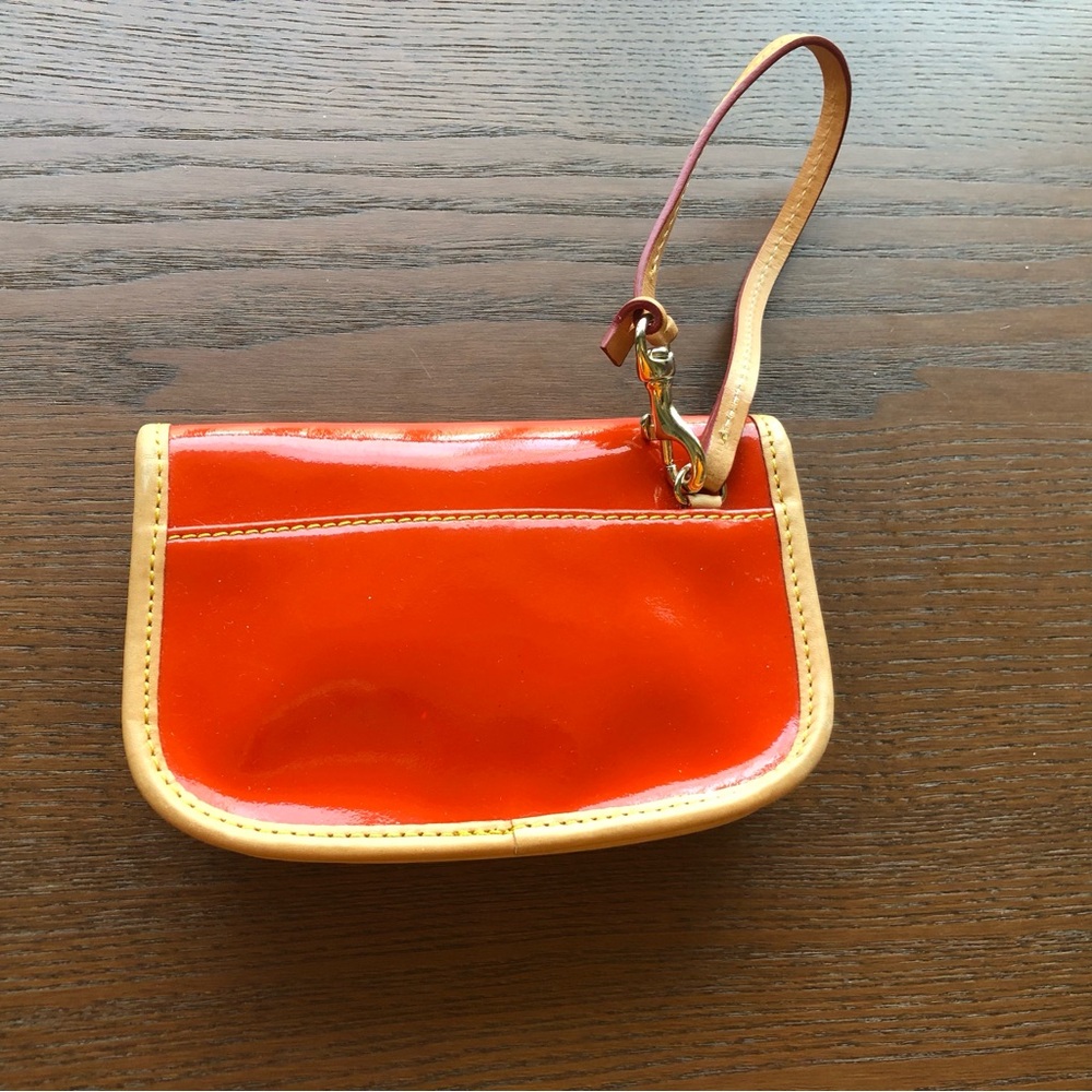 Dooney & Bourke Orange Patent Wristlet with Tan Trim - Picture 2 of 7